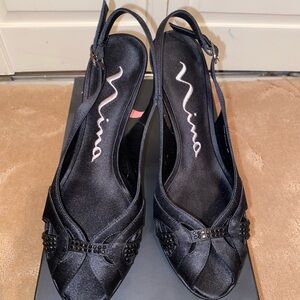 Nina D’Orsay Spicy Black Luster like new with box. Women’s size 7.